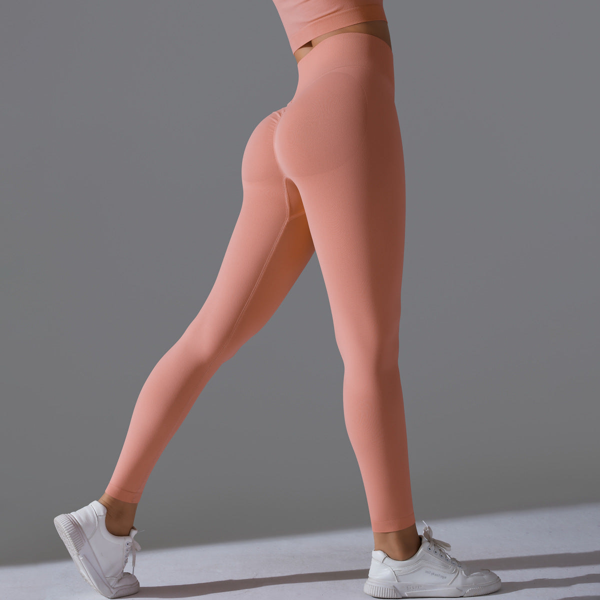 Seamless Solid Peach Sports Trousers for Women - Tight Running Fitness Yoga Pants with High Waist and Butt-Lifting Design